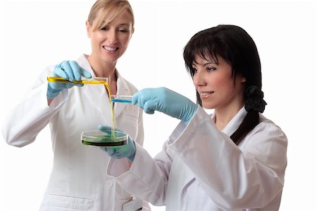 simsearch:400-04548222,k - Two happy females conduct clinical, medical  or scientific research using laboratory equipment. Stockbilder - Microstock & Abonnement, Bildnummer: 400-04569038