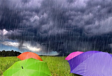 simsearch:400-07427440,k - Color Umbrellas in Rainy Storm Clouds Stock Photo - Budget Royalty-Free & Subscription, Code: 400-04569076