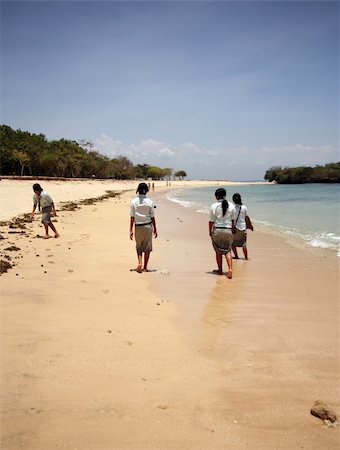 simsearch:400-04596901,k - Girls-schoolgirls on a coastal line. Bali. Indonesia Stock Photo - Budget Royalty-Free & Subscription, Code: 400-04569104