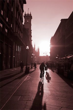 Workers riding on the bike in the morning to their job place in Milano Stock Photo - Budget Royalty-Free & Subscription, Code: 400-04569396