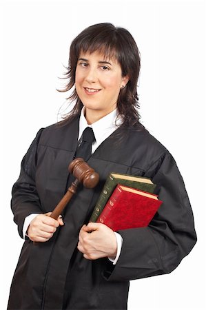 A happy female judge holding the gavel and books. Shallow depth of field Photographie de stock - Aubaine LD & Abonnement, Code: 400-04569574