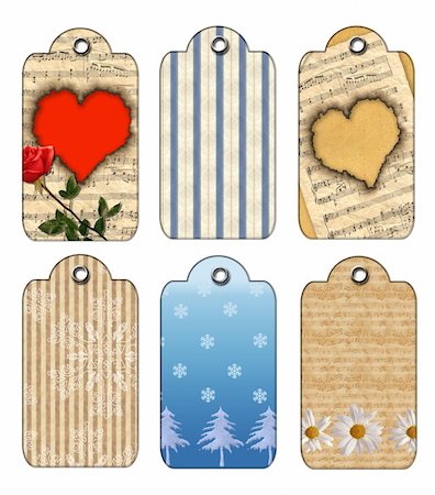 simsearch:400-04566378,k - Christmas and flowers Gift tags. Isolated on a white background Photographie de stock - Aubaine LD & Abonnement, Code: 400-04569601