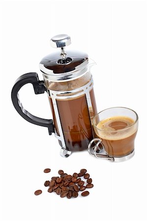 simsearch:400-05382322,k - A cup and coffee pot with beans, reflected on white background Stockbilder - Microstock & Abonnement, Bildnummer: 400-04569725