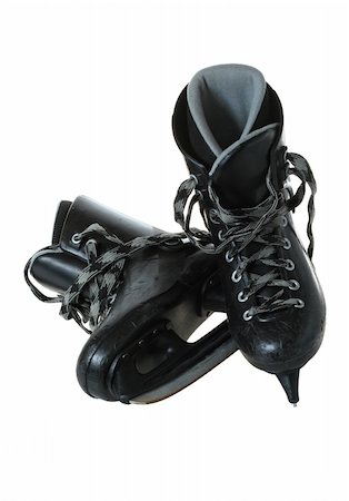 Old skates of ice hockey on a white background Stock Photo - Budget Royalty-Free & Subscription, Code: 400-04560063