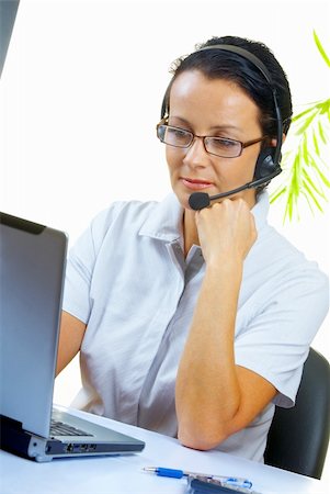 simsearch:400-04632513,k - view of nice operator in stylish glasses at her working place Photographie de stock - Aubaine LD & Abonnement, Code: 400-04560237