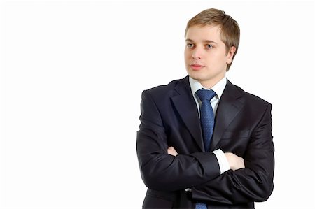 Confident young businessman full of thoughts Stock Photo - Budget Royalty-Free & Subscription, Code: 400-04560568