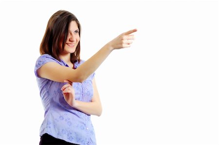 attractive young woman pointing to something Stock Photo - Budget Royalty-Free & Subscription, Code: 400-04560571