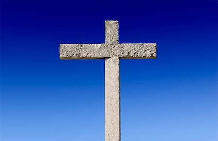 simsearch:400-05014919,k - Religious stone cross on a beautiful blue sky Photographie de stock - Aubaine LD & Abonnement, Code: 400-04560818