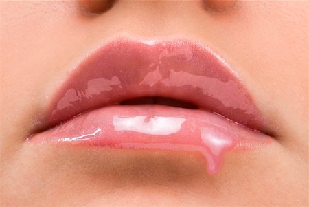 simsearch:400-05676902,k - close up of a mouth with red lipstick dropping Stock Photo - Budget Royalty-Free & Subscription, Code: 400-04560883