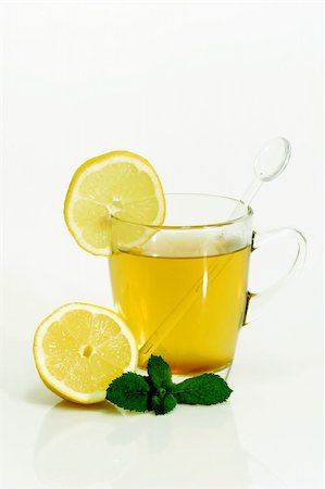 pepper mint tea - Glass of hot tea with Lemon on bright background Stock Photo - Budget Royalty-Free & Subscription, Code: 400-04561000