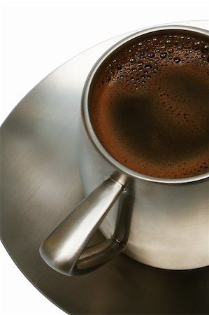 simsearch:628-02615924,k - Coffee in a metal cup on a white background Foto de stock - Royalty-Free Super Valor e Assinatura, Número: 400-04561092
