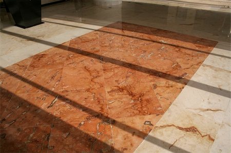 Plush marble flooring with shadows cast on it. Stockbilder - Microstock & Abonnement, Bildnummer: 400-04561769