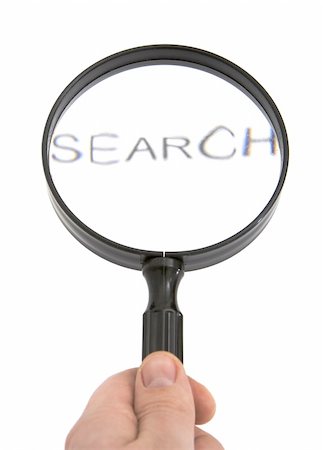 hand holding magnifying glass isolated against white background Foto de stock - Royalty-Free Super Valor e Assinatura, Número: 400-04561951