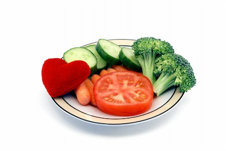 simsearch:700-02055931,k - Heart healthy snack concept with a dish of vegetables and plush heart toy isolated on a white background Foto de stock - Super Valor sin royalties y Suscripción, Código: 400-04562063