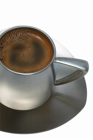 simsearch:628-02615924,k - Coffee in a metal cup on a white background Foto de stock - Royalty-Free Super Valor e Assinatura, Número: 400-04562149