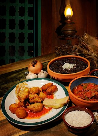 Detail of typical cuban dishes on tropical restaurant atmosphere Stock Photo - Budget Royalty-Free & Subscription, Code: 400-04562568