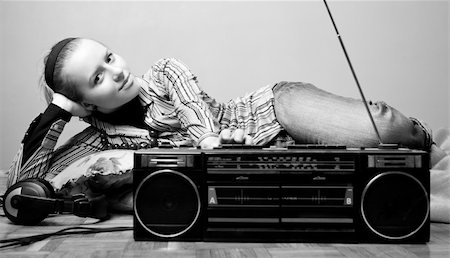 retro teenagers listening to music - young woman is listening radio Stock Photo - Budget Royalty-Free & Subscription, Code: 400-04562833