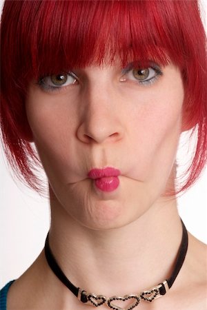 simsearch:400-04520503,k - a young woman with red hair and kissmouth Stock Photo - Budget Royalty-Free & Subscription, Code: 400-04562969