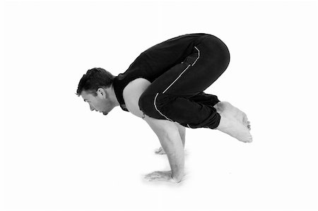 Young male gymnast practicing yoga. Stock Photo - Budget Royalty-Free & Subscription, Code: 400-04563358