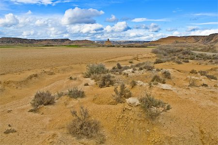 simsearch:400-03957512,k - Desert landscape under the cloudy sky in spring season Foto de stock - Super Valor sin royalties y Suscripción, Código: 400-04563351