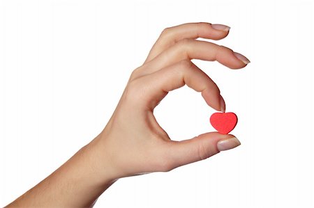 Hand holding little red heart.Isolated on white. Foto de stock - Royalty-Free Super Valor e Assinatura, Número: 400-04563389