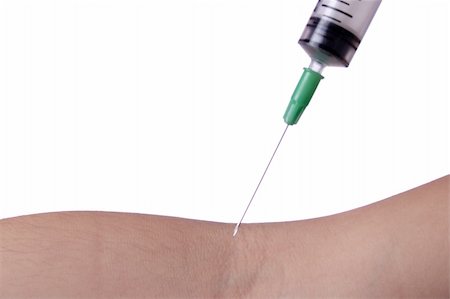 Close up of syringe needle before taking blood Foto de stock - Royalty-Free Super Valor e Assinatura, Número: 400-04563670
