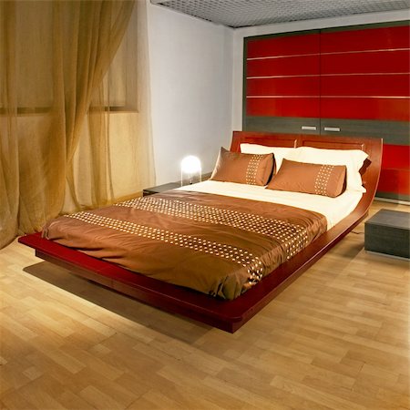 simsearch:400-05364625,k - Modern bedroom with big red bed and closet Foto de stock - Super Valor sin royalties y Suscripción, Código: 400-04574629