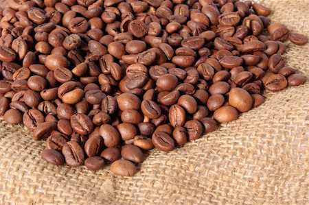Beans of coffee scattered on a sacking Stock Photo - Budget Royalty-Free & Subscription, Code: 400-04574649
