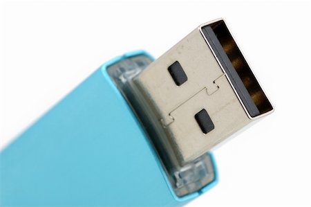 simsearch:400-05259481,k - Closeup of usb flash drive in isolated white background Stockbilder - Microstock & Abonnement, Bildnummer: 400-04574658