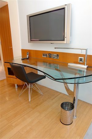 elegant tv room - Work desk with plasma TV in a modern hotel room Foto de stock - Super Valor sin royalties y Suscripción, Código: 400-04574677