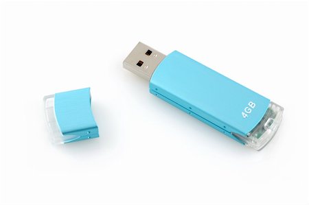 simsearch:400-05259481,k - Usb flash drive in isolated white background Stockbilder - Microstock & Abonnement, Bildnummer: 400-04574670