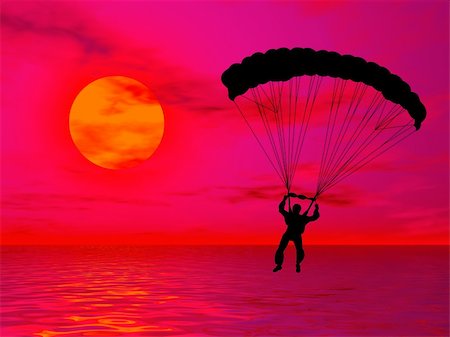 Parachutist in silhouette against a colorful sunset Stock Photo - Budget Royalty-Free & Subscription, Code: 400-04574754