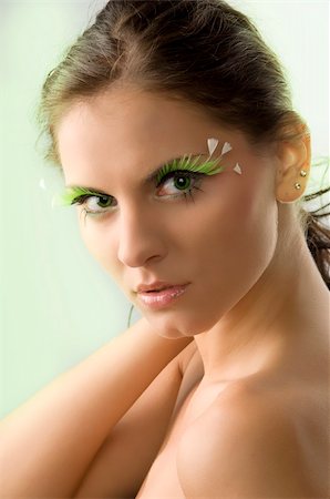 simsearch:400-04073578,k - portrait of a young and cute woman with artificial green eyelashes and green eyes Foto de stock - Super Valor sin royalties y Suscripción, Código: 400-04574949