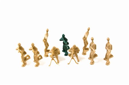 simsearch:841-06032209,k - Isolated Plastic Toy Soldiers - Dare to be Different Concept Stock Photo - Budget Royalty-Free & Subscription, Code: 400-04575436