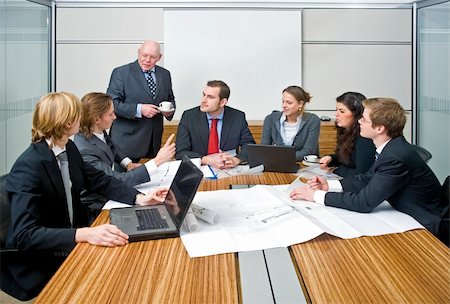 A group of six junior associates during a management team meeting with a senior manager Stock Photo - Budget Royalty-Free & Subscription, Code: 400-04575469