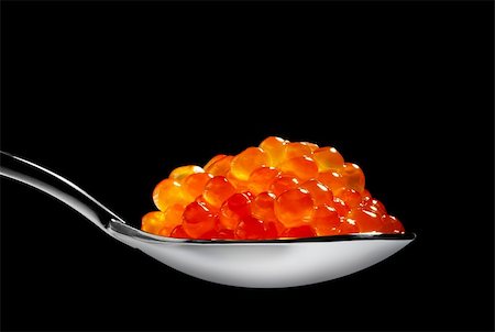 Red caviar isolated on black background Stock Photo - Budget Royalty-Free & Subscription, Code: 400-04575962
