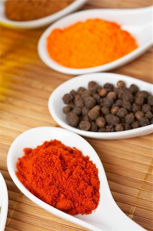 simsearch:400-03908268,k - Assortment of spices in the spoons for prepare tasty food with soft shadow in the wooden background. Shallow depth of field Photographie de stock - Aubaine LD & Abonnement, Code: 400-04576304