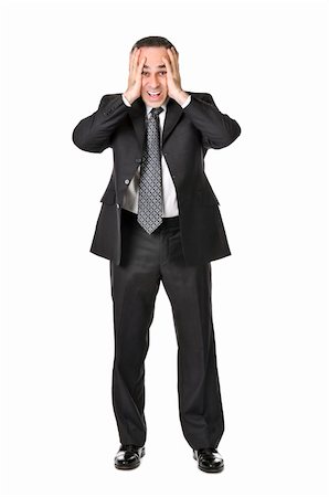 simsearch:400-04345508,k - Businessman in a suit being upset isolated on white background Stock Photo - Budget Royalty-Free & Subscription, Code: 400-04576373