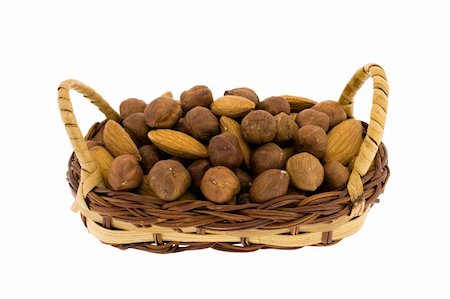 simsearch:400-07210943,k - Filbert and almonds in a wum basket isolated on white Stock Photo - Budget Royalty-Free & Subscription, Code: 400-04576426