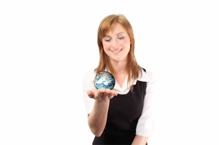 Studio lite shot of a business woman with a globe in her habd Stock Photo - Budget Royalty-Free & Subscription, Code: 400-04577144