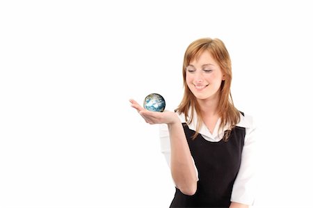 Studio lite shot of a business woman with a globe in her habd Stock Photo - Budget Royalty-Free & Subscription, Code: 400-04577145