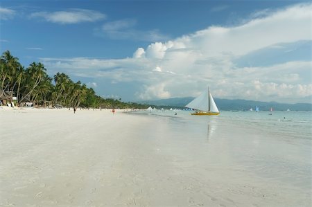 palms trees and white sand of boracay island in the philippines Foto de stock - Super Valor sin royalties y Suscripción, Código: 400-04577185
