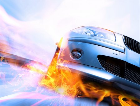 Fast car moving with motion blur with fire burning tires Stock Photo - Budget Royalty-Free & Subscription, Code: 400-04577314