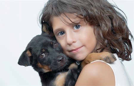 simsearch:400-04162652,k - Portrait of little girl having good time with her puppy Stockbilder - Microstock & Abonnement, Bildnummer: 400-04578249