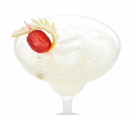 simsearch:400-07555096,k - Refreshment Acoholic Drink made of Tequila, Lemon Juice, and Liqueur. Served with salt on the glass rim. Lemon and Strawberry Garnish. Isolated on White Background. Stock Photo - Budget Royalty-Free & Subscription, Code: 400-04570150