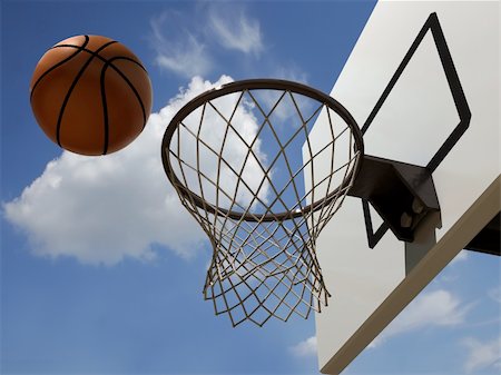 Basketball in air over hoop - rendered in 3d Stock Photo - Budget Royalty-Free & Subscription, Code: 400-04570283