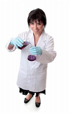 A smiling scientist using laboratory equipment. Stock Photo - Budget Royalty-Free & Subscription, Code: 400-04570924