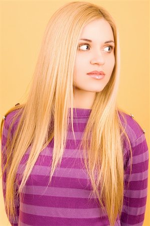 simsearch:400-04780842,k - a pretty looking blonde  girl in a violet sweater Stock Photo - Budget Royalty-Free & Subscription, Code: 400-04571518