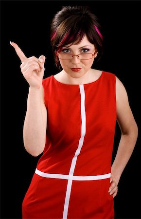 Young sexy female teacher in a red dress Foto de stock - Super Valor sin royalties y Suscripción, Código: 400-04572147