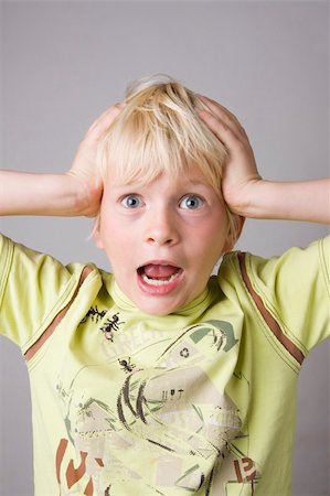 simsearch:400-05069351,k - Portrait of a young boy shouting madly Stock Photo - Budget Royalty-Free & Subscription, Code: 400-04573116